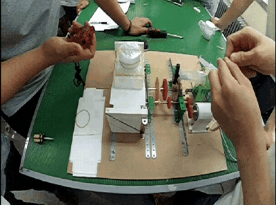 (a) Vibration machine — demonstration